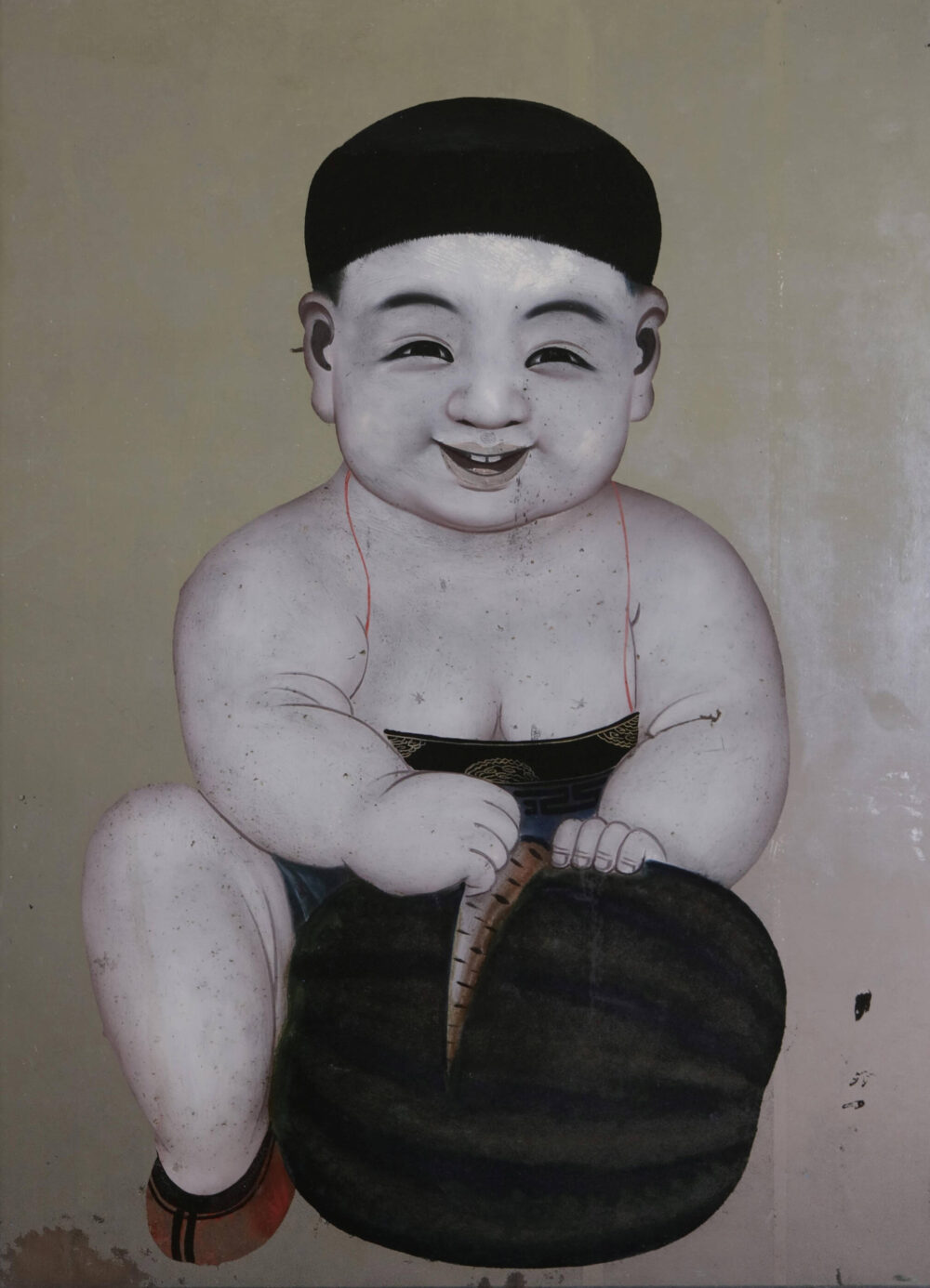 Hinterglasbild eines kleinen Jungen mit einer Melone.