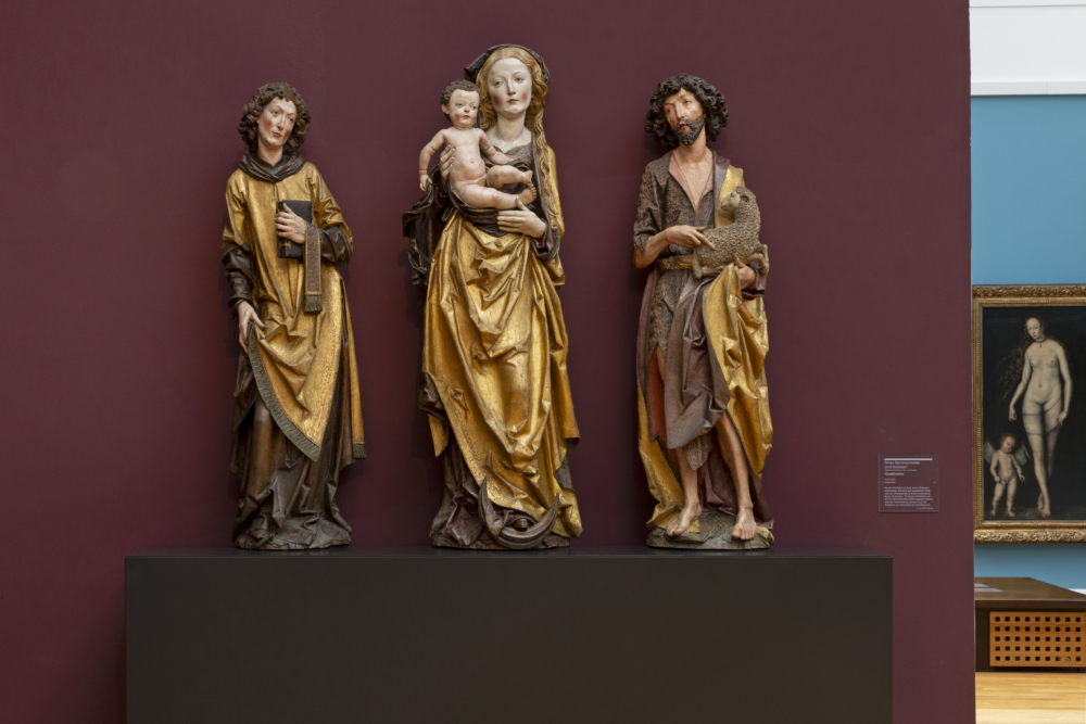 Drei hölzerne Renaissance-Skulpturen aus einem Gnadenaltar von Tilman Riemenschneider.